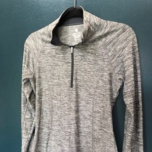 Woman’s Gray and Black Athletic Wear Top